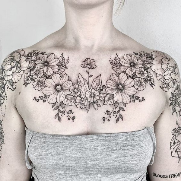 grey flower tattoo chest