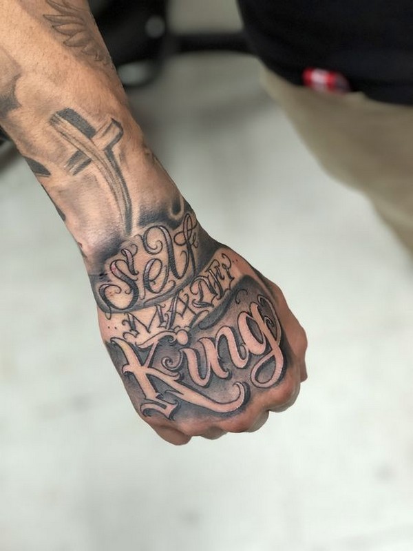 hand word tattoo
