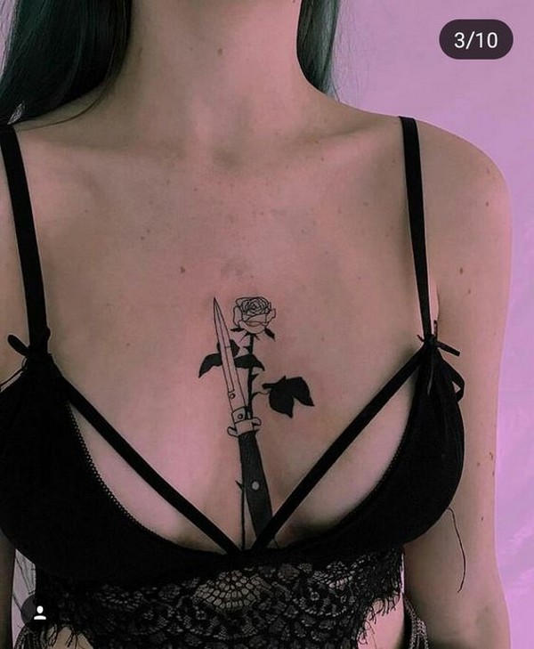 knife rose chest tattoo