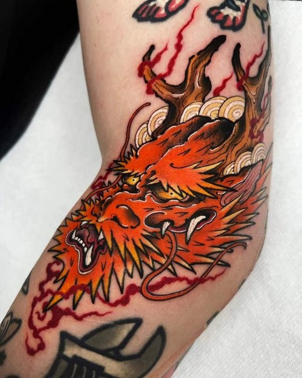 mini red dragon tattoo