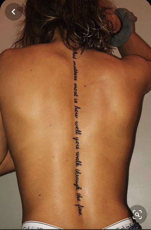 nice word tattoo spine