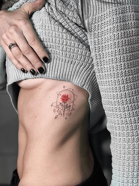 rose waist tattoo