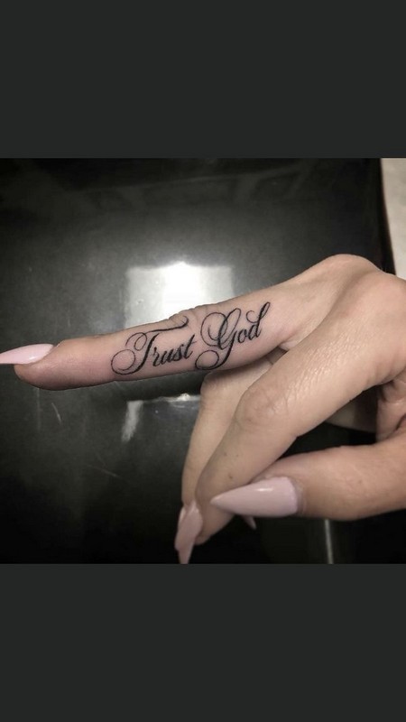 word finger tattoo