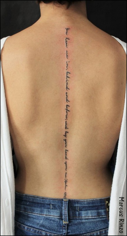 word tattoo spine